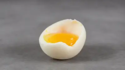 boiled whole egg, grey background